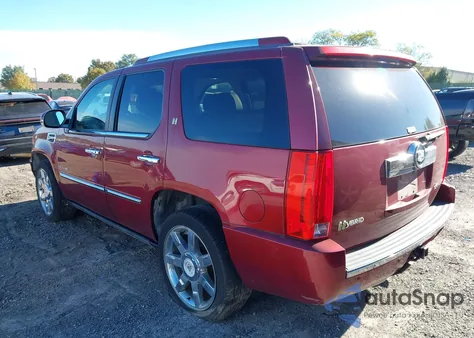 2010 Cadillac Escalade Hybrid Standard z USA, uszkodzony, nr VIN 1GYUKEEJ5AR220655